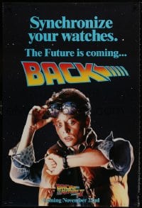 8w068 BACK TO THE FUTURE II teaser DS 1sh 1989 Michael J. Fox as Marty, synchronize your watches!