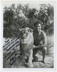 8y667 BUSTER CRABBE signed 8x10.25 REPRO still 1980s posing with lion in King of the Jungle!