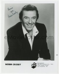 8y524 NORM CROSBY signed 8x10 publicity still 1970s great smiling portrait from his talent agency!
