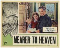 9b505 LEASE OF LIFE English LC 1954 c/u of happy Robert Donat & Kay Walsh reading letter!