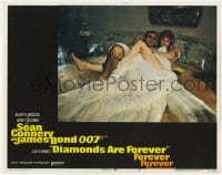 9b218 DIAMONDS ARE FOREVER LC #3 1971 Sean Connery as James Bond under fur blanket w/Jill St. John