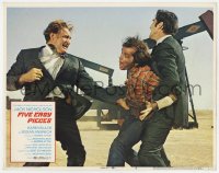 9b269 FIVE EASY PIECES LC #2 1970 Jack Nicholson being beaten up by two men by oil well, Rafelson