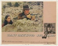 9b418 JOE KIDD LC #4 1972 Clint Eastwood with gun protecting Stella Garcia behind a rock!