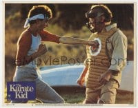 9b433 KARATE KID LC #6 1984 Pat Morita as Mr. Miyagi trains Ralph Macchio in self defense!