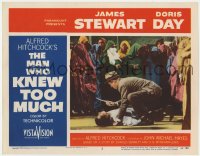 9b553 MAN WHO KNEW TOO MUCH LC #2 1956 great image of Jimmy Stewart w/knife over man, Hitchcock!
