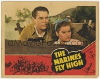 9b559 MARINES FLY HIGH LC 1940 c/u of Chester Morris with gun protecting Lucille Ball in wagon!