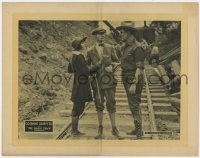 9b781 SINGLE TRACK LC 1921 man tells Corinne Griffith no strangers allowed on train tracks!