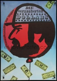 9f270 AZ ELVARAZSOLT DOLLAR East German 23x32 1987 Istvan Bujtor, art of man in balloon plus money!