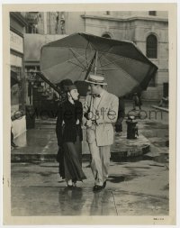 9h362 EASTER PARADE 8x10.25 still 1948 Peter Lawford walks Judy Garland home under his umbrella!