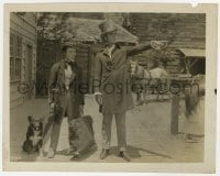9h741 OUR HOSPITALITY 8x10 still 1923 Buster Keaton with dog & carpetbag given directions!