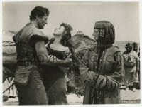 9h272 CONQUEROR English 7x9.5 still 1956 John Wayne as Genghis Khan grabs Susan Hayward!