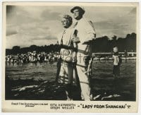 9h581 LADY FROM SHANGHAI English FOH LC R1950s Orson Welles behind blonde Rita Hayworth!