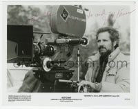9r413 JEFF KANEW signed 8x10 still 1984 candid of the director with camera filming Gotcha!