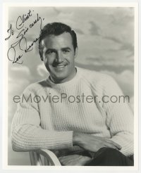 9r956 REX REASON signed 8x10 REPRO still 1980s great seated smiling portrait in white sweater!