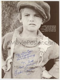 9r135 JACKIE COOGAN signed 8x11 cut book page 1980s by Jackie Coogan, cute portrait of the child star sitting on chair!