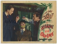 9y278 ARSENIC & OLD LACE LC 1944 Peter Lorre & Raymond Massey toast over bound & gagged Cary Grant!