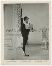 1a063 AMERICAN IN PARIS 8x10.25 still 1951 Leslie Caron reading book with her leg above her head!