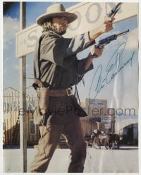 1h754 CLINT EASTWOOD signed color 8x10 REPRO still 1990s with two guns drawn in Outlaw Josey Wales!