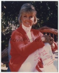 1h763 DORIS DAY signed color 8x10 REPRO still 1980s seated smiling portrait in red sweater!