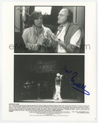 1h468 PHIL COLLINS signed 8x10.25 still 1999 composing & performing soundtrack for Disney's Tarzan!