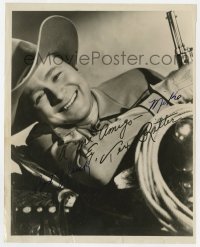 1h521 TEX RITTER signed 8x10.25 still 1940s great smiling portrait of the cowboy star with gun!