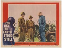 1r238 DAY THE EARTH STOOD STILL LC #4 1951 Michael Rennie as Klaatu in full uniform by soldiers!