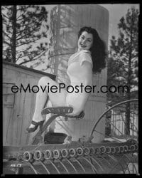 1x104 RUTH HAMPTON 8x10 negative 1950s full-length sexy portrait sitting on farm equipment!