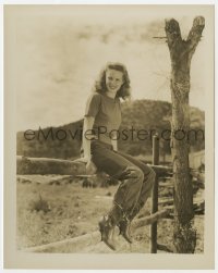 2a064 BARBARA BRITTON 8x10.25 still 1947 portrait of the sexy actress sitting on fence from Gunfighters!