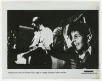 2a143 CINEMA PARADISO 8x10 still 1990 Salvatore Cascio looking at film strip by Philippe Noiret!