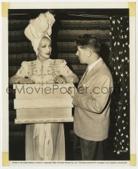 2a304 FOLLOW THE BOYS candid 8x10 still 1944 director w/Marlene Dietrich about to be sawed in half!