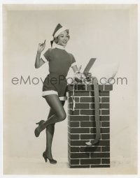 2a631 MONICA LEWIS 8x10.25 still 1951 as sexy Santa suit with fishnet nylons checking her list!