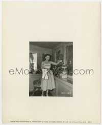 2a698 PAULETTE GODDARD 8x10 key book still 1948 at home in cotton dress while making Hazard!