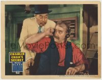 3b386 CHARLIE CHAN'S SECRET LC 1936 Asian detective Warner Oland stands over Francis Ford on radio!