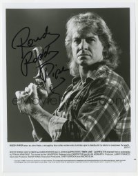 3d661 RODDY PIPER signed 8x10.25 still 1988 great close portrait with gun from They Live!