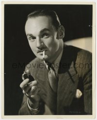 3h343 GAY DIVORCEE 8.25x10.25 still 1934 RKO studio portrait of Erik Rhodes lighting his cigarette!