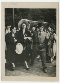 3h774 RITA HAYWORTH 5x7 news photo 1940s hostess escorts her away from Paris race track crowd!