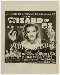 3h967 WIZARD OF OZ 8x10 still R1949 older Judy Garland & co-stars on different six-sheet image!