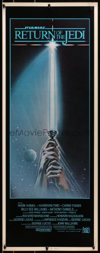 3p215 RETURN OF THE JEDI int'l insert 1983 George Lucas, art of hands holding lightsaber by Reamer!
