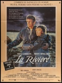 3w889 RIVER French 1p 1985 Mark Rydell directed, close up of Mel Gibson holding Sissy Spacek!