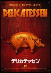 3y778 DELICATESSEN Japanese 1991 Jean-Pierre Jeunet & Marc Caro, golden pig & man in trash!