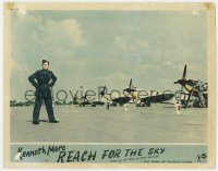 4a753 REACH FOR THE SKY English LC 1956 great image of Kenneth More by airplanes at airfield!