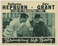 4a283 BRINGING UP BABY LC R1941 May Robson stares at Cary Grant wearing Hepburn's fuzzy robe!