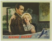 4a439 FLYING TIGERS LC 1942 great close up of pilot John Wayne holding pretty nurse Anna Lee!