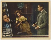 4a609 LOST MOMENT LC #8 1947 Robert Cummings looks worried at Susan Hayward tending to Moorehead!