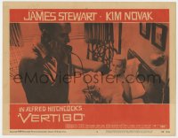 4a950 VERTIGO LC #5 1958 Alfred Hitchcock, standing James Stewart on phone,blonde Kim Novak in bed!
