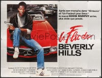 4b744 BEVERLY HILLS COP French 8p 1985 great image of cop Eddie Murphy sitting on Mercedes!