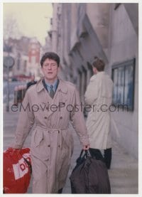 4d026 BARRY ANDREWS color 6x8.5 still 1980s candid image on street carrying his luggage!