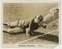 4d374 FRESHMAN  8x10 still 1925 great c/u of football player Harold Lloyd grabbing opponent's leg!