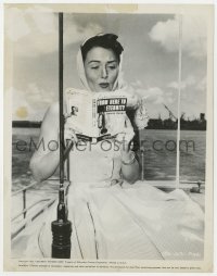 4d376 FROM HERE TO ETERNITY candid 8x10.25 still 1953 Donna Reed reading the source novel outdoors!