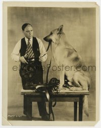 4d842 SHADOWS OF THE NIGHT candid 8x10.25 still 1928 Flash the wonder dog holding film for cutter!